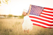 © MeganBetteridge - Adorable patriotic girl with american flag