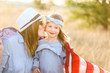 © MeganBetteridge - Patriotic mother and daughter with American flag