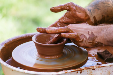 Master class on pottery, a close-up / The picture was taken in Russia, in the city of Orenburg, at the fair of the historical reconstruction festival 