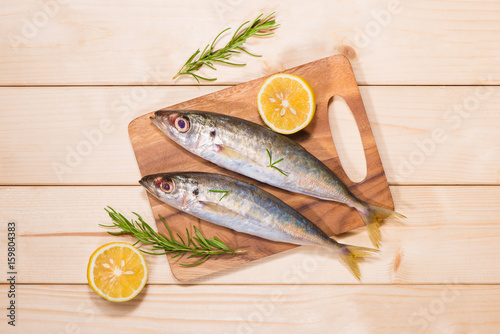 Fotografija Fish dish cooking with various ingredients