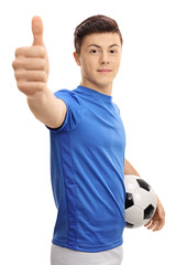 Sticker - Teenage soccer player with football making thumb up gesture