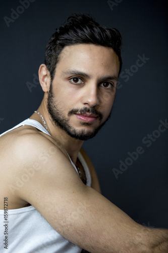 Portrait Of Handsome Dark Haired Man Smiling Buy This Stock