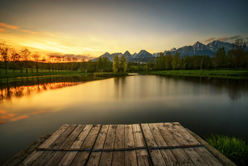 Wall Mural - sunset above a lake in high tatra mountains in slovakia