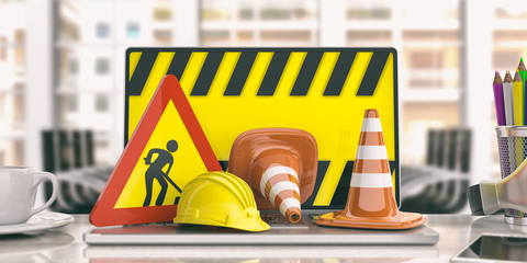 Construction safety equipment on a laptop, 3d illustration