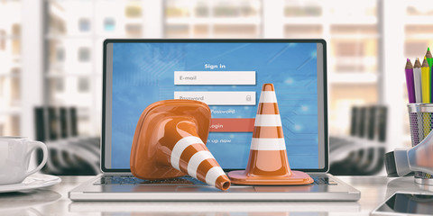 Traffic cones on a laptop, 3d illustration