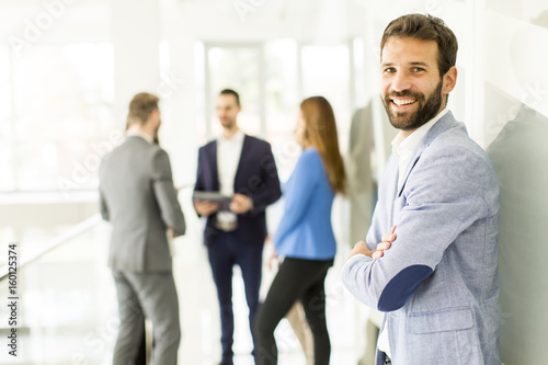 Fotografie, Obraz Portrait of handsome young businessman standing
