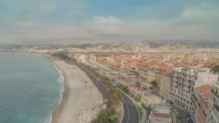 Poster - time lapse city view. Embankment, sea, beach and buildings in nice france. Azure coast on a sunny day. People walking on seafront cars driving on the road.