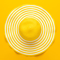 Poster - top view of yellow striped retro hat close-up. summer concept