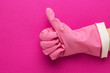 canvas print picture - hand in pink protective glove shows thumbs up. cleaning service concept