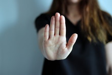 Woman's Hand Showing Reject Or Stop.