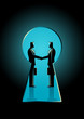 Businessmen shaking hands seen through a keyhole
