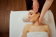 © Studio Romantic - Massage the head of  neck to a young woman in massage room.