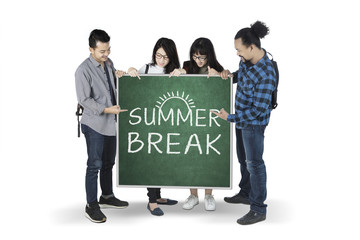 Wall Mural - Multiracial students show a text of summer break