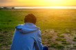© Sabphoto - Young Man at Sunset