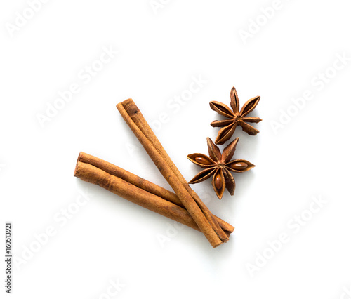 Fotografía Two cinnamon sticks lying on table, topview