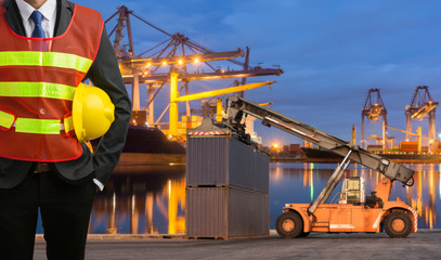 Foreman or working man control loading Containers box