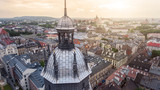 Fototapeta Londyn - Aerial view of the Corpus Christi Church and Wawel Castle in Krakow, Poland at sunset time