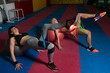 © Jale Ibrak - Couple Train Together With Resistance Bands On Ball