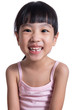Leinwandbild Motiv Happy Asian Chinese little girl with toothless smile