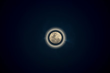 Lunar Eclipse On The Deep Blue Sky.