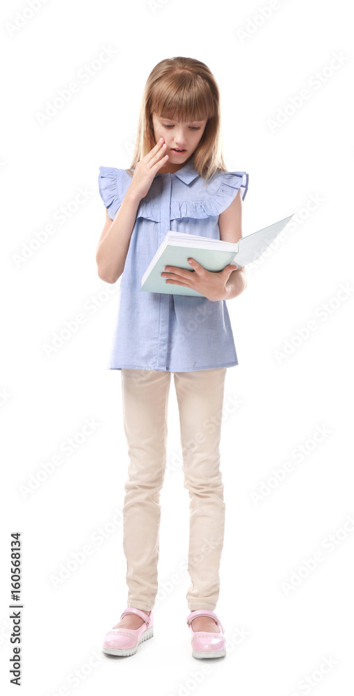 Pretty little girl with book on white background