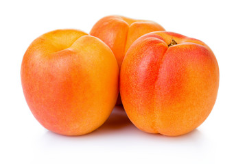 Wall Mural - Ripe apricot fruits isolated on white