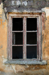 Old wooden window without glass.