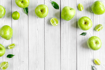 Wall Mural - summer food with green apples on white background top view mock up