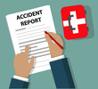 Businessman Completing Accident Report document beside First Aid Kit - Health and Safety concept
