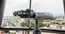 Binoculars On Tower