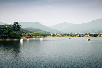 Canvas Print - Duck boat on lake with mountain at Uirimji Reservoir in Jecheon, Korea