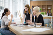 © ReeldealHD images - Female coworkers working on a project