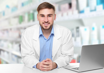 Handsome doctor on white background