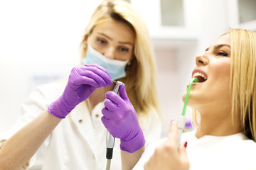 Wall Mural - Young Woman At The Dentist