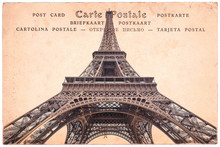 Eiffel Tower In Paris, France, Collage On Sepia Vintage Postcard Background, Word "postcard" Written In Several Languages