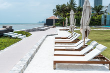 Beautiful Luxury Umbella And Chair  In Beachfront Hotel