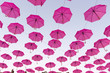 Umbrellas floating in the sky