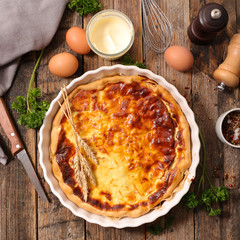 Canvas Print - quiche with ingredient on wooden background