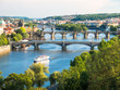 view over vltava river and its bridges with charles bridge in background