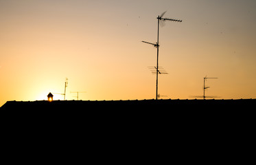 Sunset between roofs 2