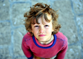 Portrait of a shaggy boy looking at camera