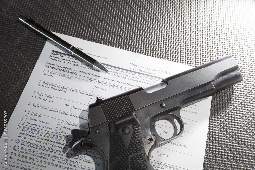 Semi-auto pistol chambered in .45 with the 4473 ATF background check ...