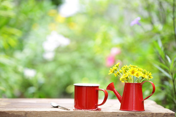 Wall Mural - flower in red pot and coffee in red cup