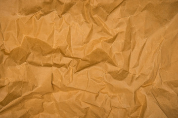 Wall Mural - Brown crumpled paper texture background