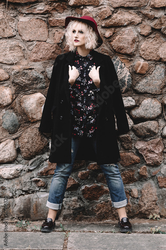 Beautiful Cute Blonde Girl With Curly Hair In A Hat And Black Coat