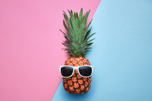 Fashion Hipster Pineapple Fruit. Bright Summer Color, Accessories. Tropical Pineapple With Sunglasses. Creative Art Concept. Minimal Style. Summer Party Background