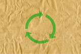 Fototapeta  - symbol for refuse reuse recycle with cardboard background