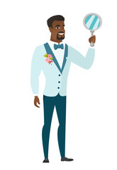 Poster - African-american groom holding hand mirror.