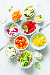 Wall Mural - Vegetarian snacks - colorful vegetables and dips in bowls