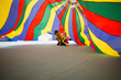 © Sarah Rypma - Children playing underneath colourful parachute